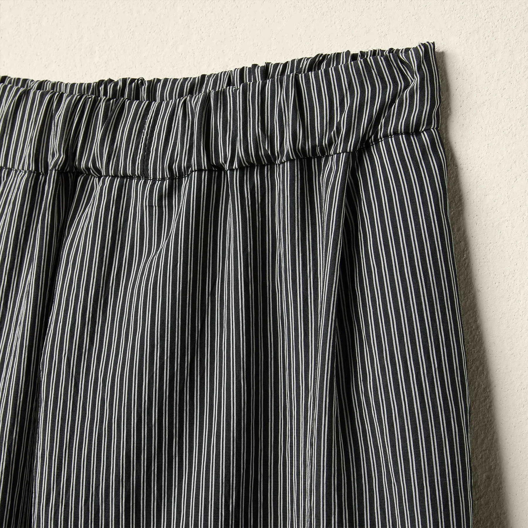 LOOSE TROUSERS IN STRIPED FABRIC